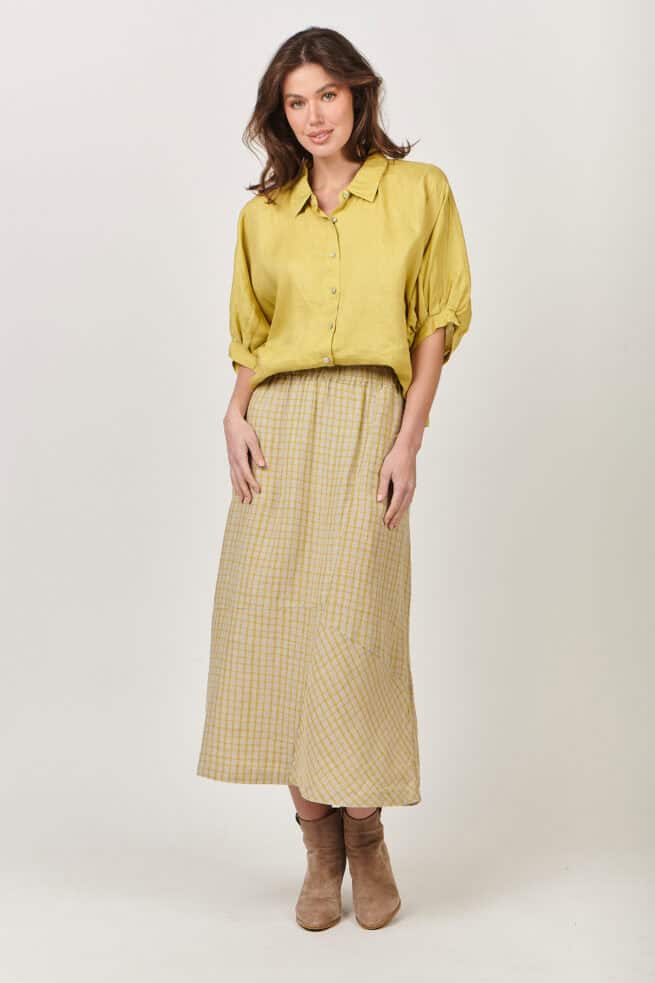 GA474 Matrix Asymmetry never looked so good. GA474 is a midi linen skirt with an elastic waist and A- line design. Asymmetrical panels on the front and back offer an original twist on a classic silhouette. The model is 169cm tall and wears a size S equivalent to a size 10